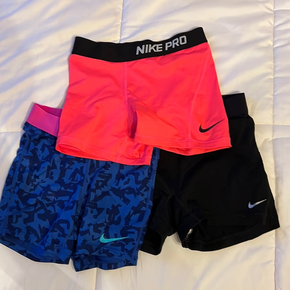 3 Nike Pro athletic shorts